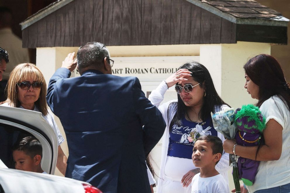 PHOTO: A woman grieves after the funeral for Jose Flores Jr., one of the victims of the Robb Elementary school mass shooting, before going to his burial at Sacred Heart Catholic church in Uvalde, Texas, June 1, 2022.
