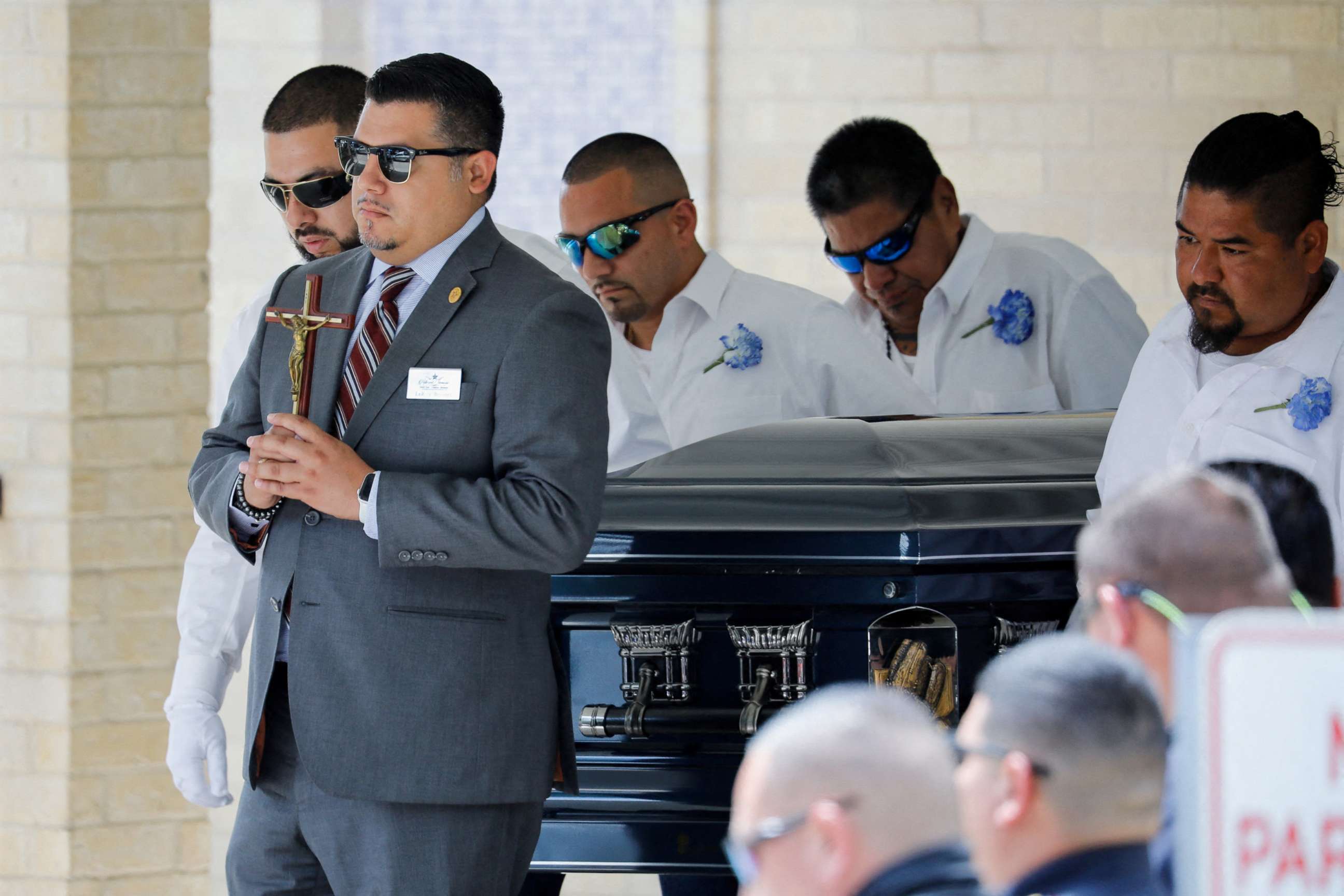 PHOTO: People carry the coffin of Jose Flores Jr, one of the victims of the Robb Elementary school mass shooting that resulted in the deaths of 19 children and two teachers, out of Sacred Heart Catholic Church, in Uvalde, Texas, June 1, 2022.