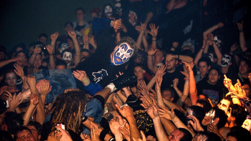 Violent J of Insane Clown Posse crowd surfs over the audience of juggalos.