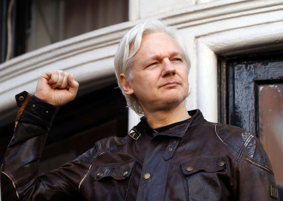 PHOTO: Julian Assange greets supporters outside the Ecuadorian embassy in London, May 19, 2017.