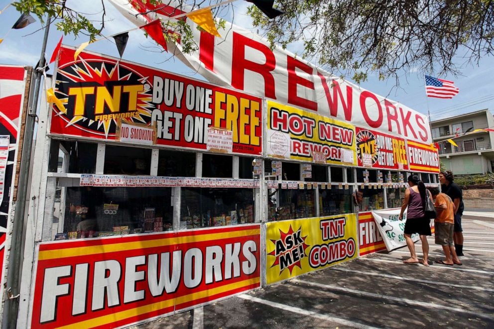 PHOTO: In this July 2, 2013, file photo, a family buys fireworks at a TNT Fireworks stand in Monterey Park, Calif.