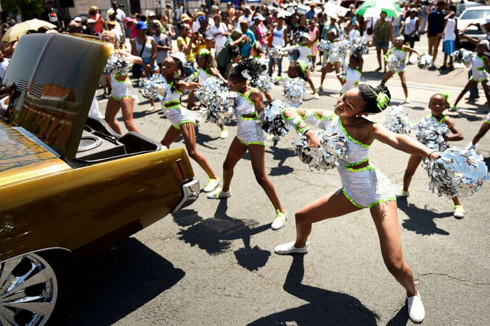 PHOTO: In this June 20, 2015, file photo, the Denver Dancing Diamonds perform during the Juneteenth Celebration parade in Denver.