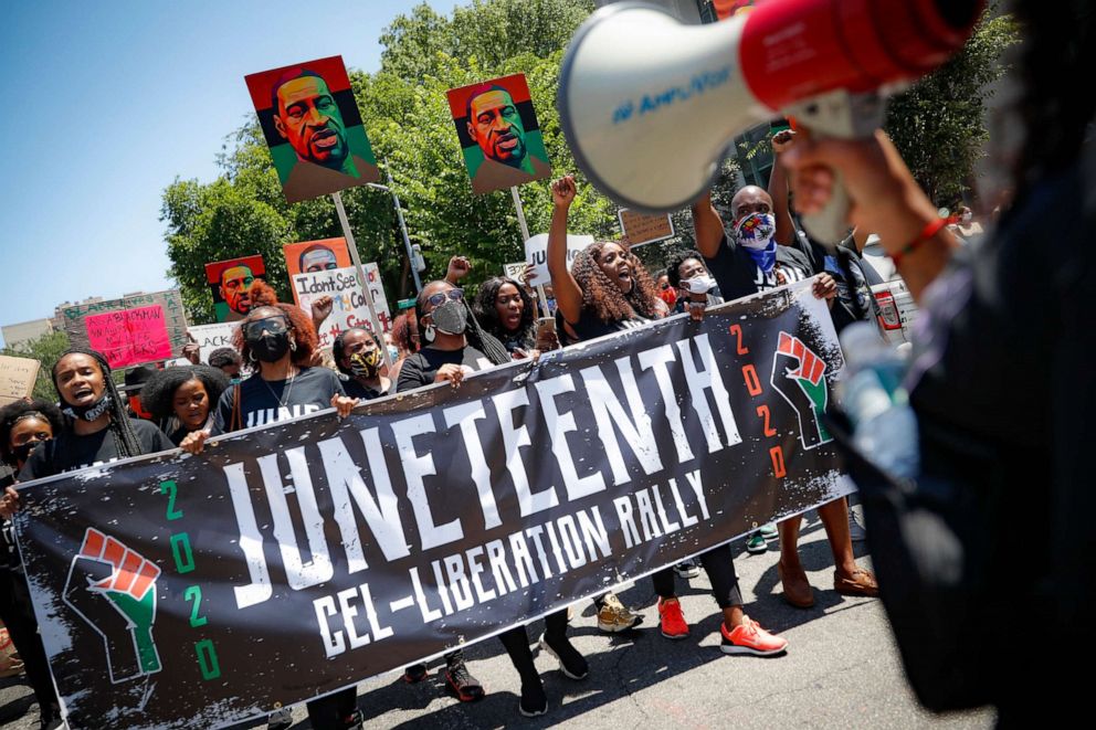 PHOTO: In this June 19, 2020, file photo, protesters chant as they march after a Juneteenth rally at the Brooklyn Museum, in Brooklyn, N.Y.