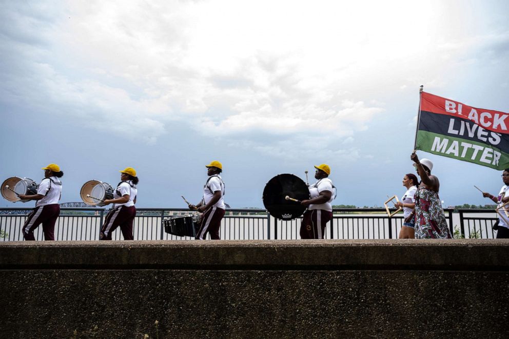 PHOTO: River City Drum Corps marches during the Juneteenth commencement of On the Banks of Freedom on June 19, 2021, in Louisville, Ky.
