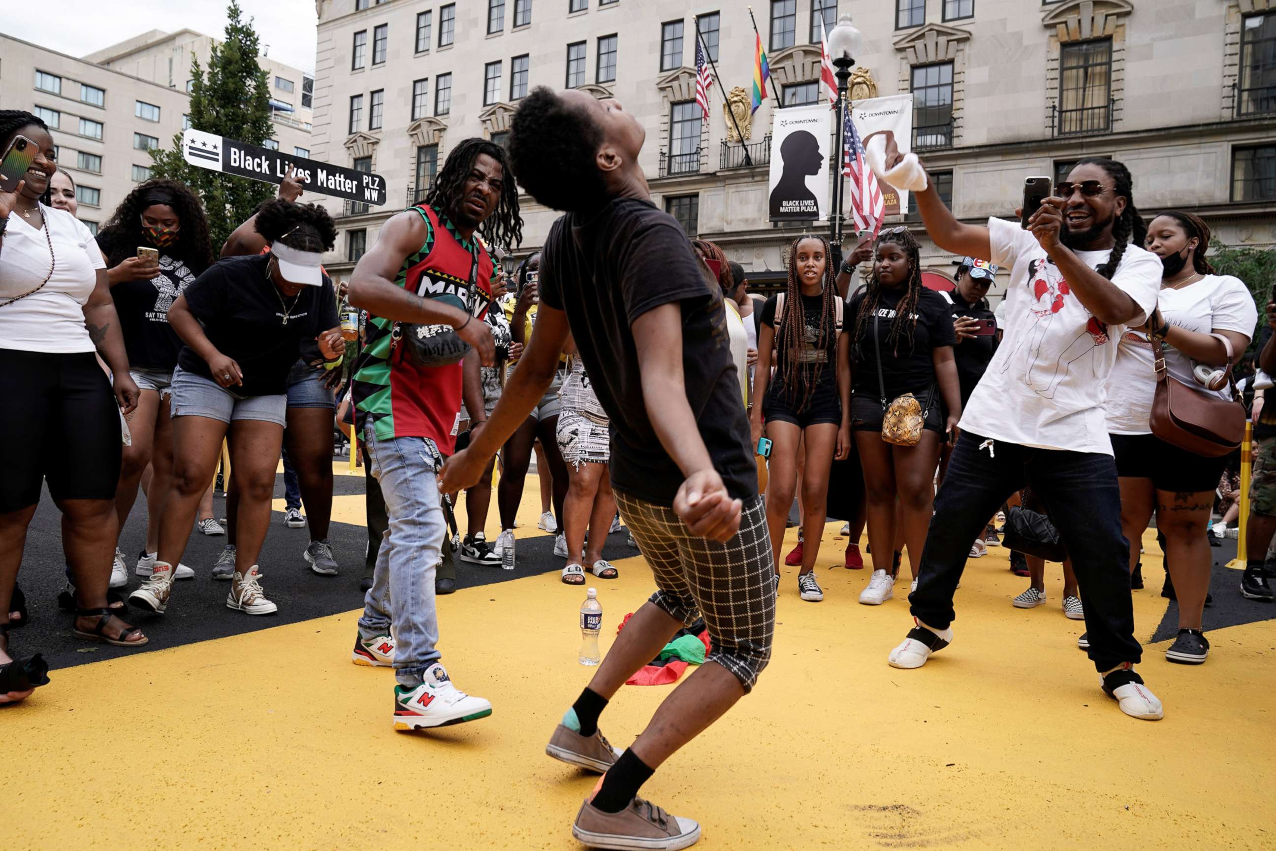 PHOTO: People celebrate Juneteenth at Black Lives Matter Plaza in Washington, D.C., June 19, 2021.