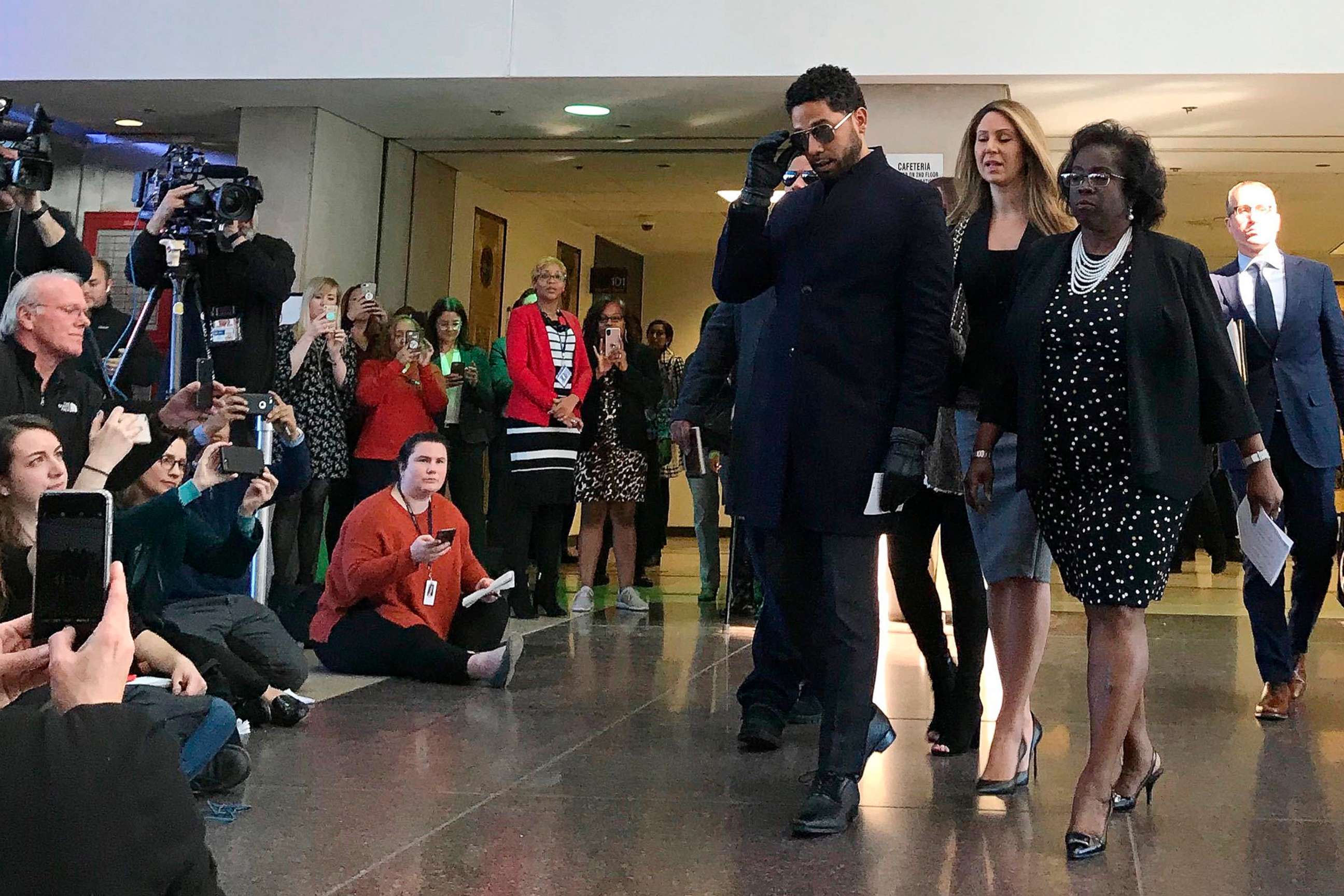 PHOTO: Empire actor Jussie Smollett arrives at a news conference after a hearing at the Leighton Criminal Court Building, March 26, 2019, in Chicago.