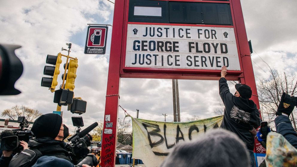 PHOTO: People celebrate the guilty verdict in the Dereck Chauvin trail at the intersection of 38th Street and Chicago Avenue, April 20, 2021, in Minneapolis.