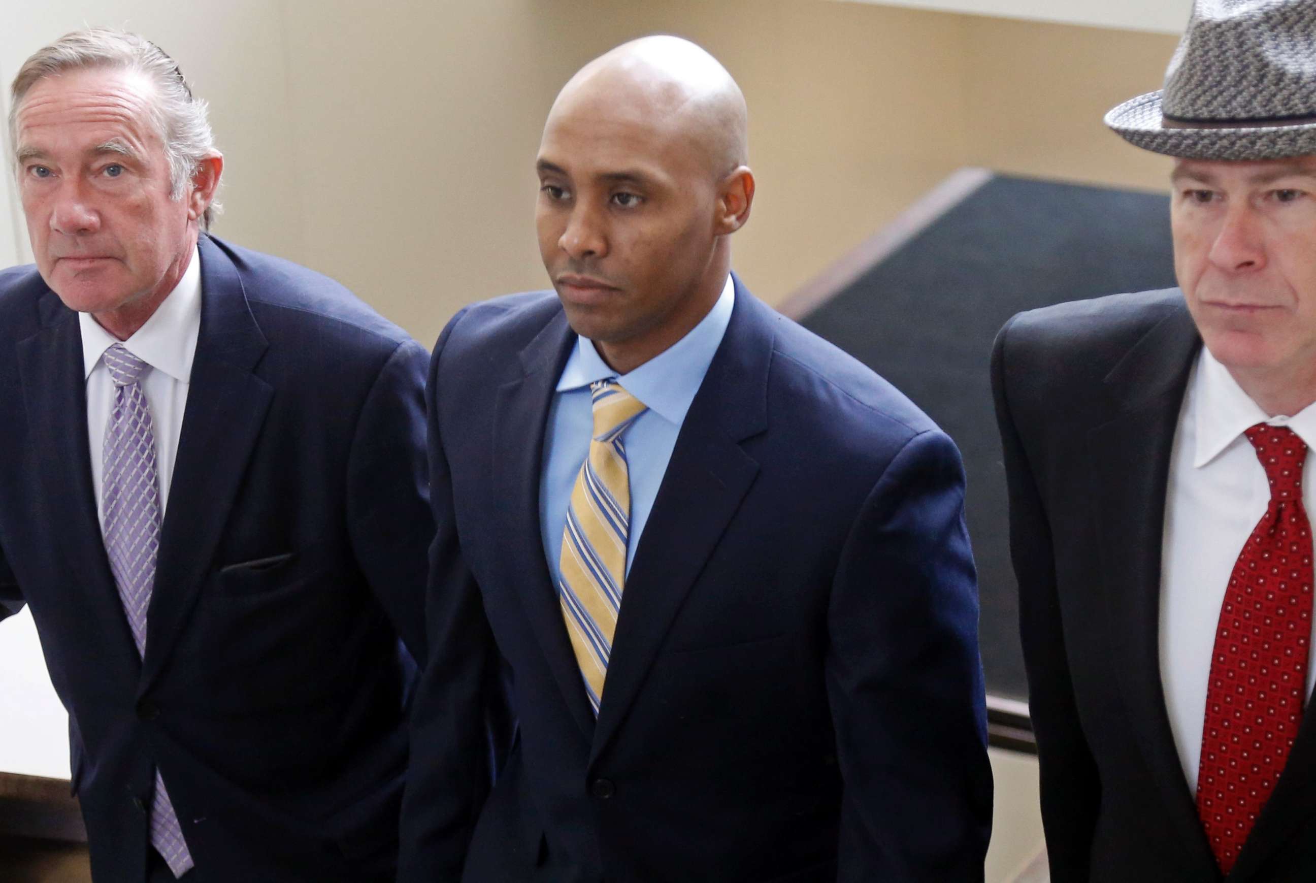 PHOTO: Mohamed Noor arrives with his legal team at the Hennepin County Government Center for a hearing, May 8, 2018, in Minneapolis.