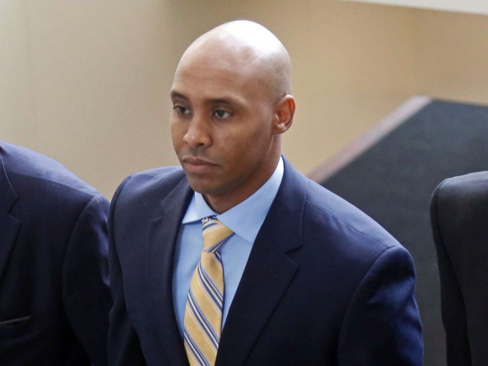 PHOTO: Mohamed Noor arrives with his legal team at the Hennepin County Government Center for a hearing, May 8, 2018, in Minneapolis.