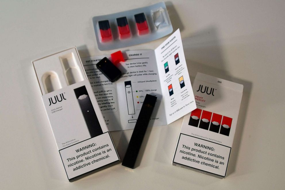 PHOTO: In this October 2, 2018, file photo illustration, the contents of an electronic Juul cigarette box are shown.