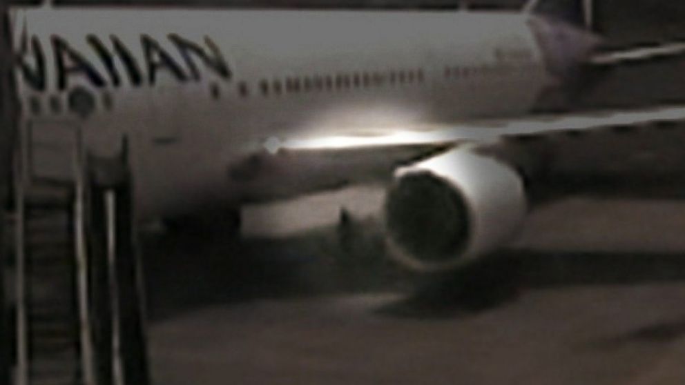 PHOTO: Surveillance video shows a California teenager who hid in the wheel well of a Hawaiian Airlines plane at Mineta San Jose International Airport in April, 2014.