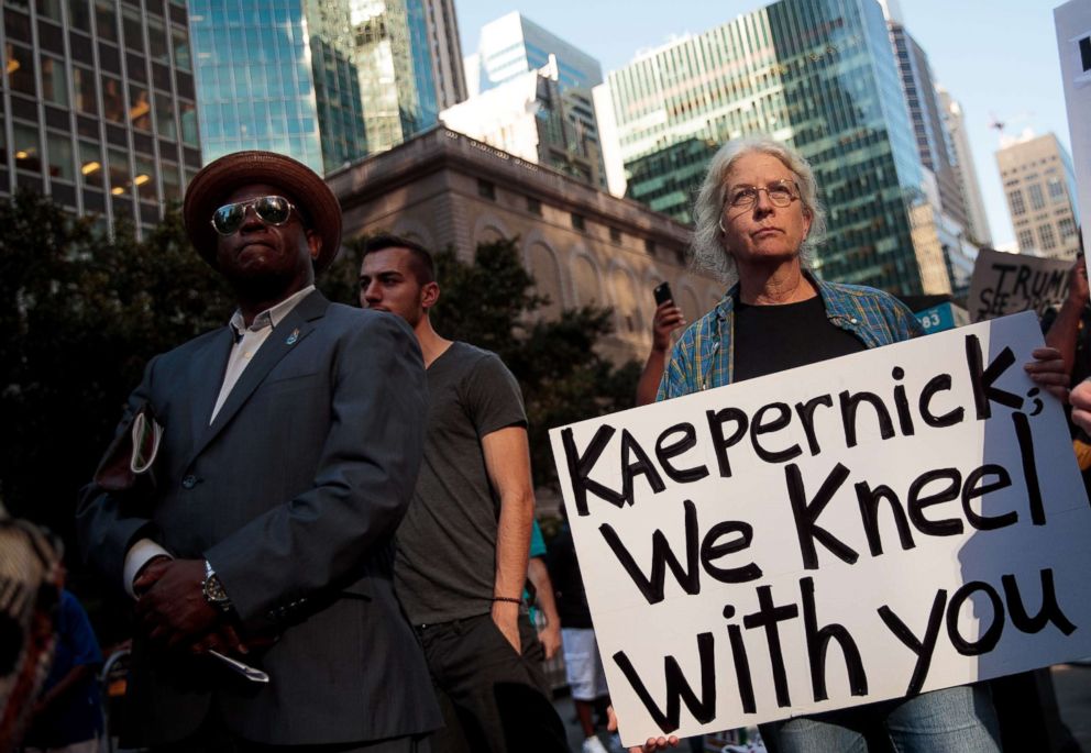 PHOTO: Activists rally in support of NFL quarterback Colin Kaepernick outside the offices of the National Football League on Park Avenue, Aug. 23, 2017, in New York.