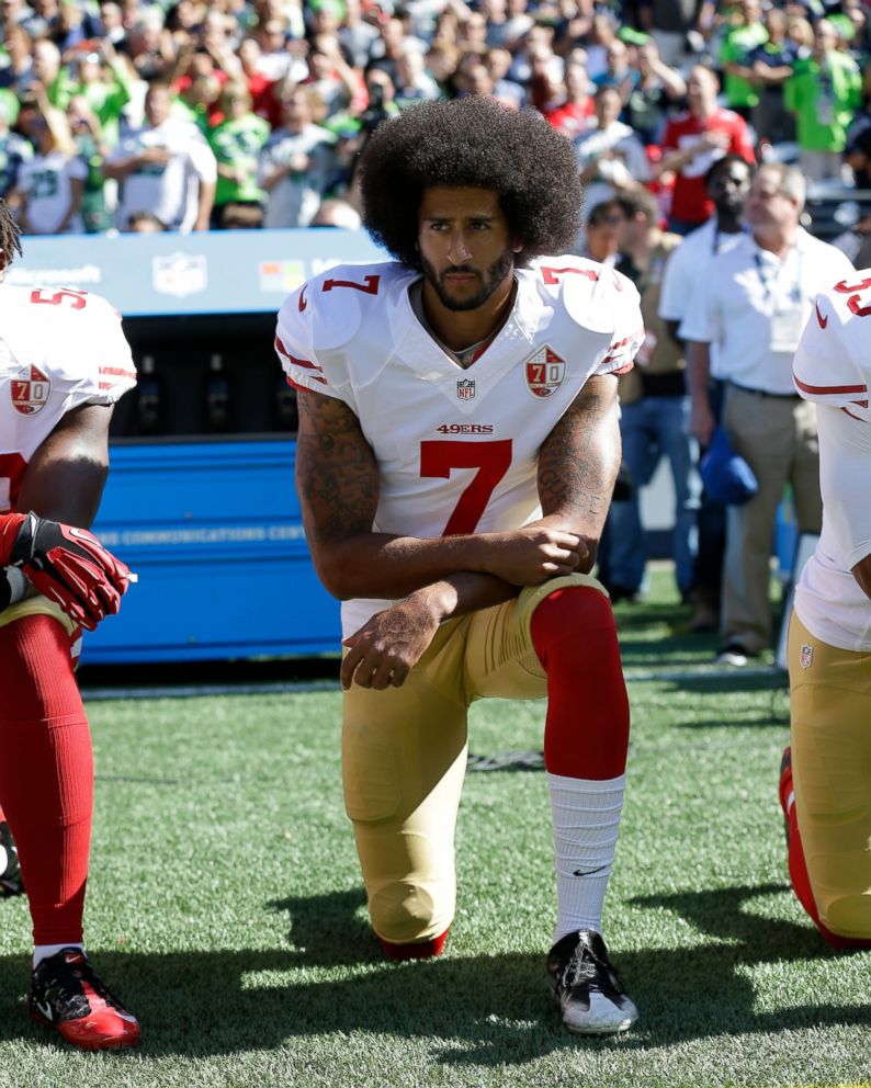 In this Sept. 25, 2016, file photo, San Francisco 49ers' Colin Kaepernick kneels during the national anthem before an NFL football game against the Seattle Seahawks, in Seattle.