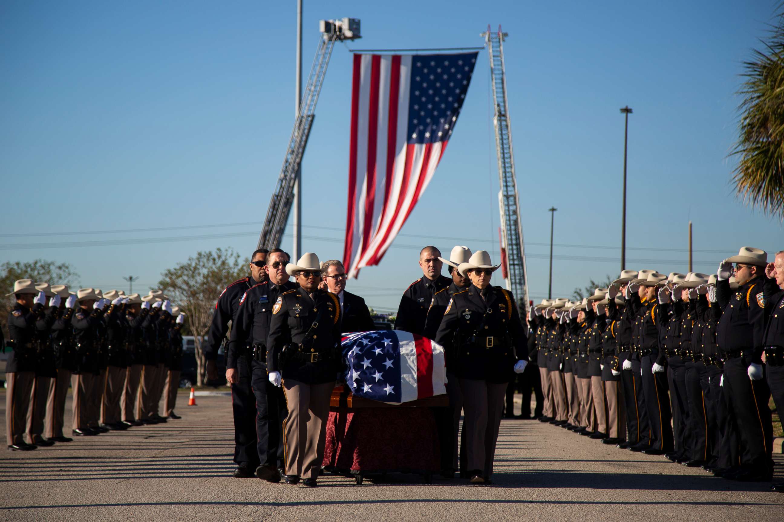 PHOTO: An Honor Guard has a Cordon of Honor to receive Nassau Bay Police Department Sgt. Kaila Sullivan on Dec. 18, 2019, in Houston.
