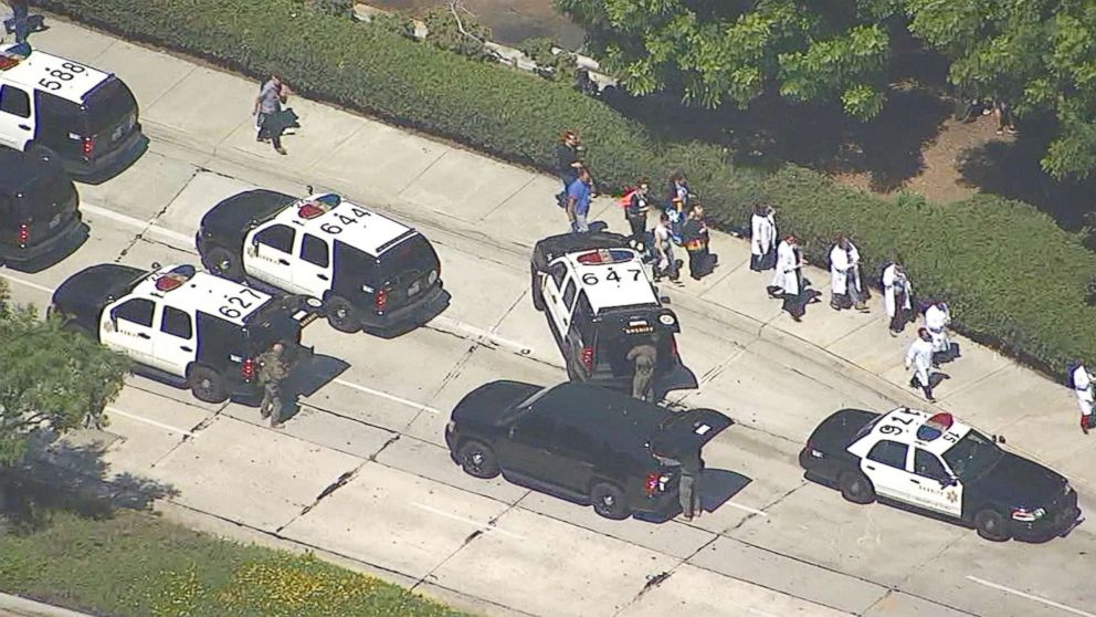 PHOTO: Police activity is seen outside Kaiser Medical Center in Downey, Calif., following reports of an active shooter.