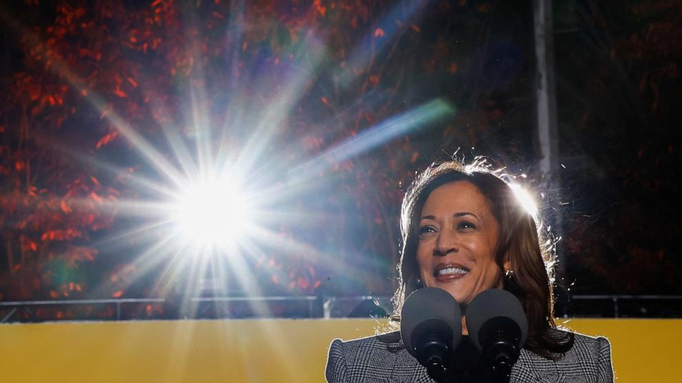 PHOTO: Democratic presidential nominee U.S. Vice President Kamala Harris and Vice-Presidential candidate Tim Walz speaks during a campaign rally and concert in Ann Arbor, Michigan, Oct. 28, 2024.
