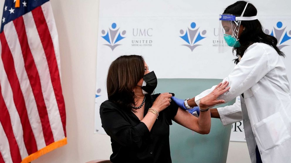 PHOTO: Vice President-elect Kamala Harris thanks nurse Patricia Cummings after she received the Moderna COVID-19 vaccine from Cummings, Dec. 29, 2020, at United Medical Center in southeast Washington, D.C.