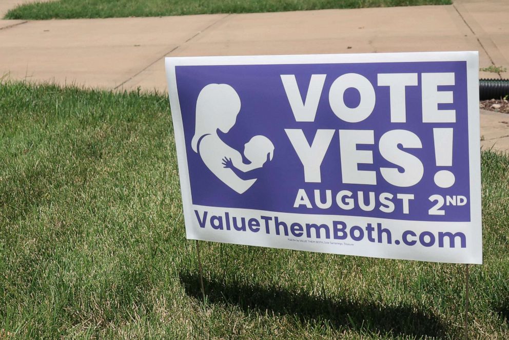 PHOTO: A sign in a yard in Olathe, Kansas, promotes a proposed amendment to the Kansas Constitution to allow legislators to further restrict or ban abortion, July 8, 2022.