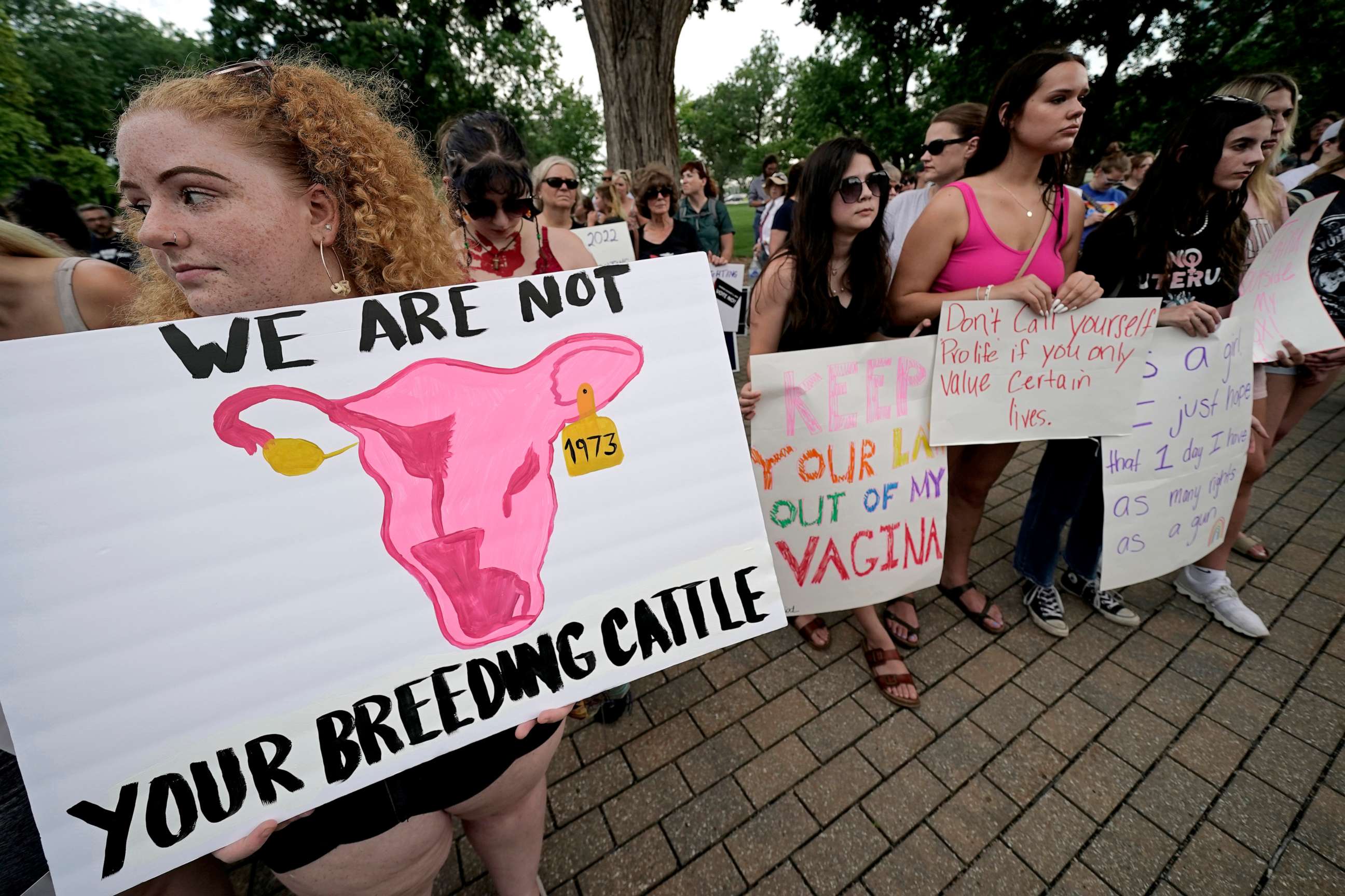 PHOTO: Abortion-rights advocates gather outside a the Kansas Statehouse in Topeka, Kan., to protest the U.S. Supreme Court's ruling on abortion, June 24, 2022.