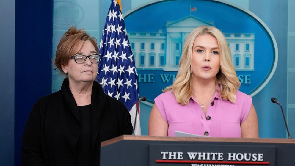 PHOTO: White House press secretary Karoline Leavitt speaks with reporters in the James Brady Press Briefing Room at the White House, April 16, 2025, in Washington, as Patty Morin, mother of Rachel Morin listens.