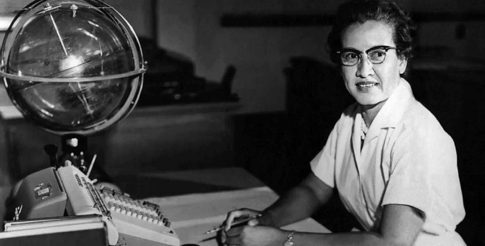 PHOTO: NASA space scientist, and mathematician Katherine Johnson poses for a portrait at her desk with an adding machine and a "Celestial Training device" at NASA Langley Research Center in 1962 in Hampton, Va.