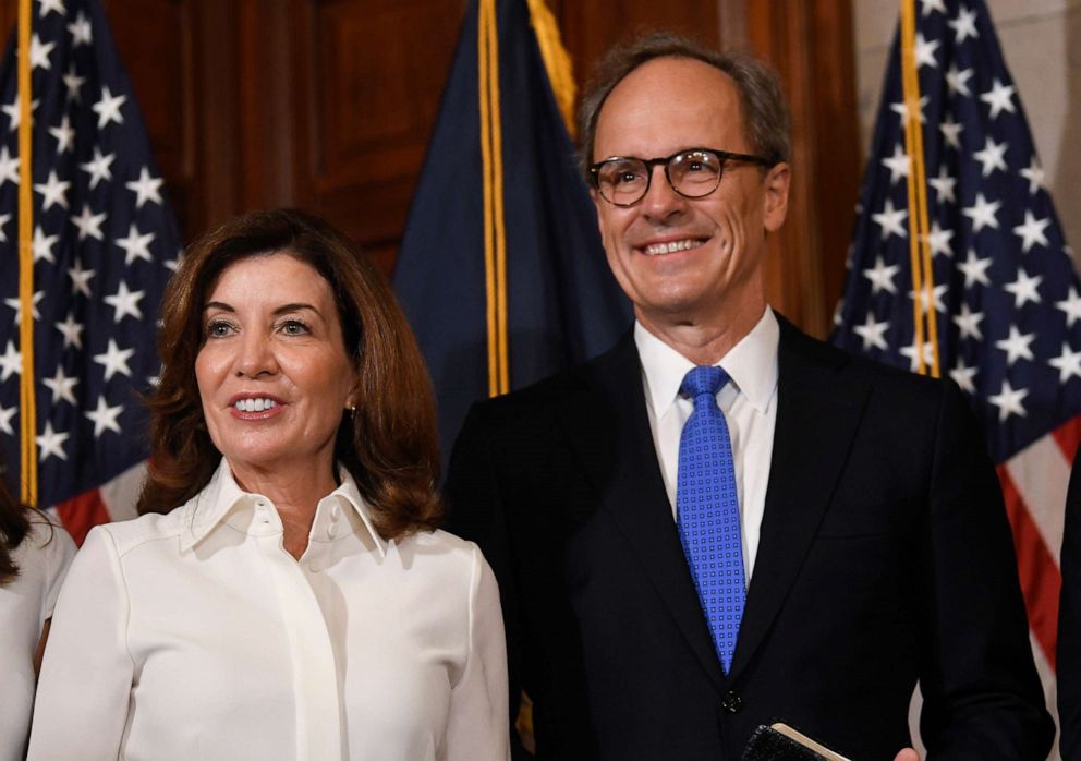 PHOTO: New York Gov. Kathy Hochul, left, stands with her husband Bill Hochul after a ceremonial swearing-in ceremony at the state Capitol, Aug. 24, 2021, in Albany, N.Y.