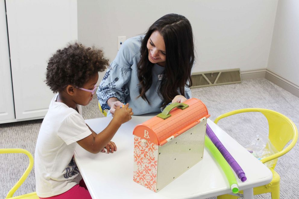 PHOTO:Speech pathologist and founder of Chatter, Katie Kringen works with children at her solo practice in Williston, N.D.