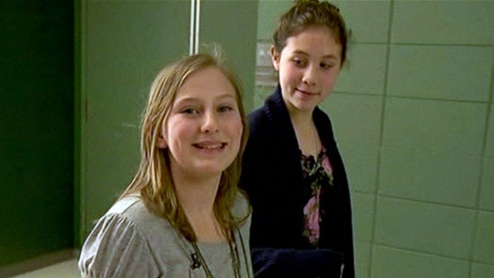 PHOTO: 7th graders Avery Burn and Genae Vanek, pictured here, handed out compact mirrors with positive messages to girls at Rock Creek Middle School in Happy Valley, Ore. on March 19, 2015. 