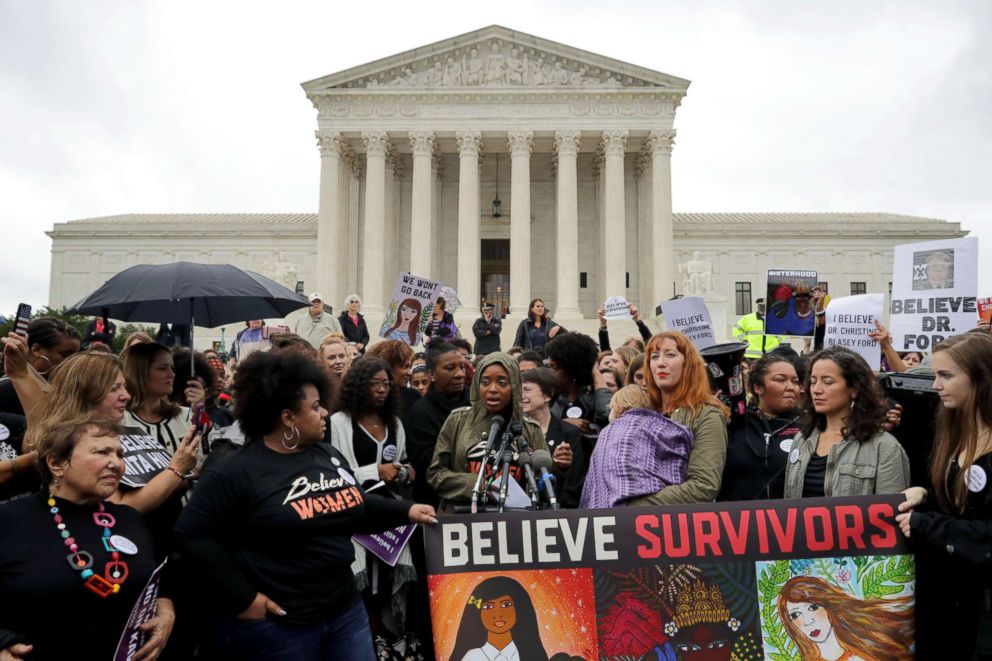 PHOTO: Women's March co-president Tamika Mallory, center, speaks at a rally against the confirmation of Judge Brett Kavanaugh in front of the Supreme Court building in Washington, D.C., Sept. 24, 2018.