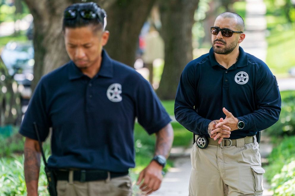 PHOTO: U.S. Marshals patrol outside the home of Supreme Court Justice Brett Kavanaugh, in Chevy Chase, Md., Wednesday, June 8, 2022.