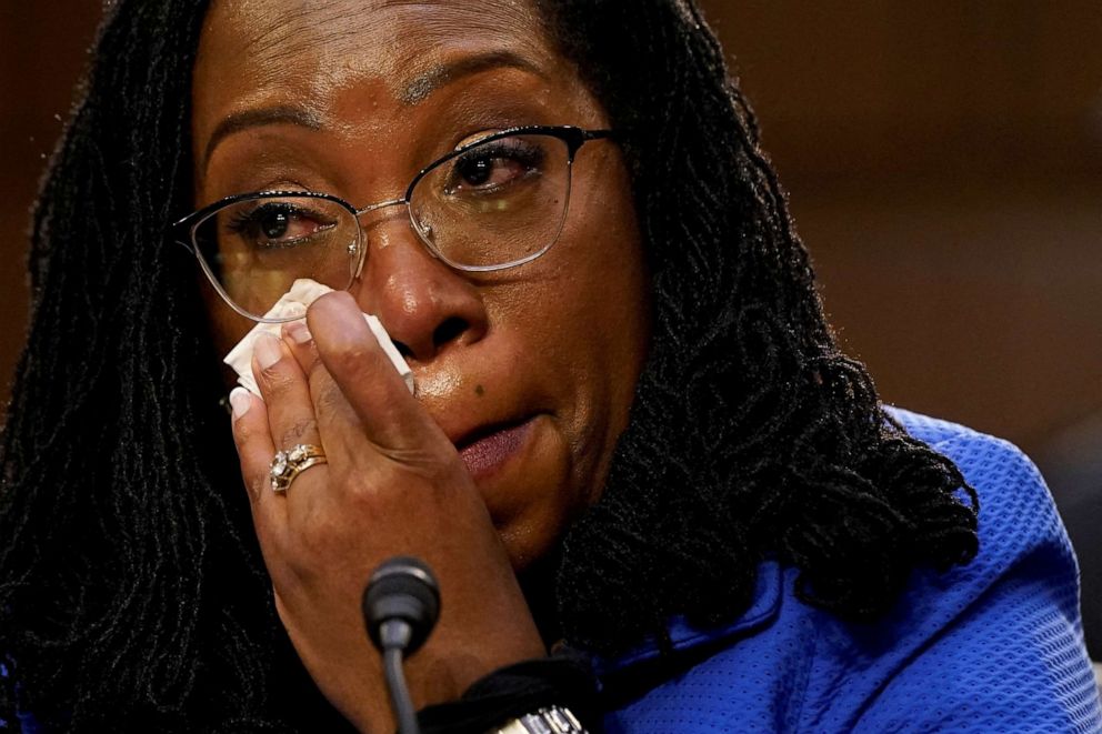 Judge Ketanji Brown Jackson wipes away tears as she listens to Sen. Cory Booker speak on the third day of the U.S. Senate Judiciary Committee confirmation hearings on her nomination to the U.S. Supreme Court, on Capitol Hill in Washington, March 23, 2022.