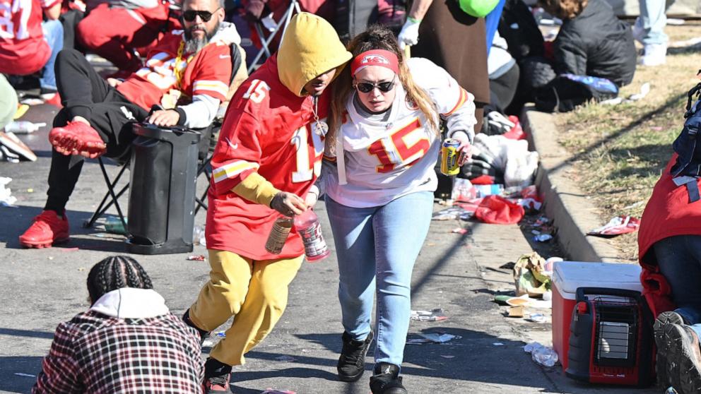 PHOTO: Fans leave the area after shots were fired after the celebration of the Kansas City Chiefs winning Super Bowl LVIII, Feb 14, 2024; Kansas City, Mo.