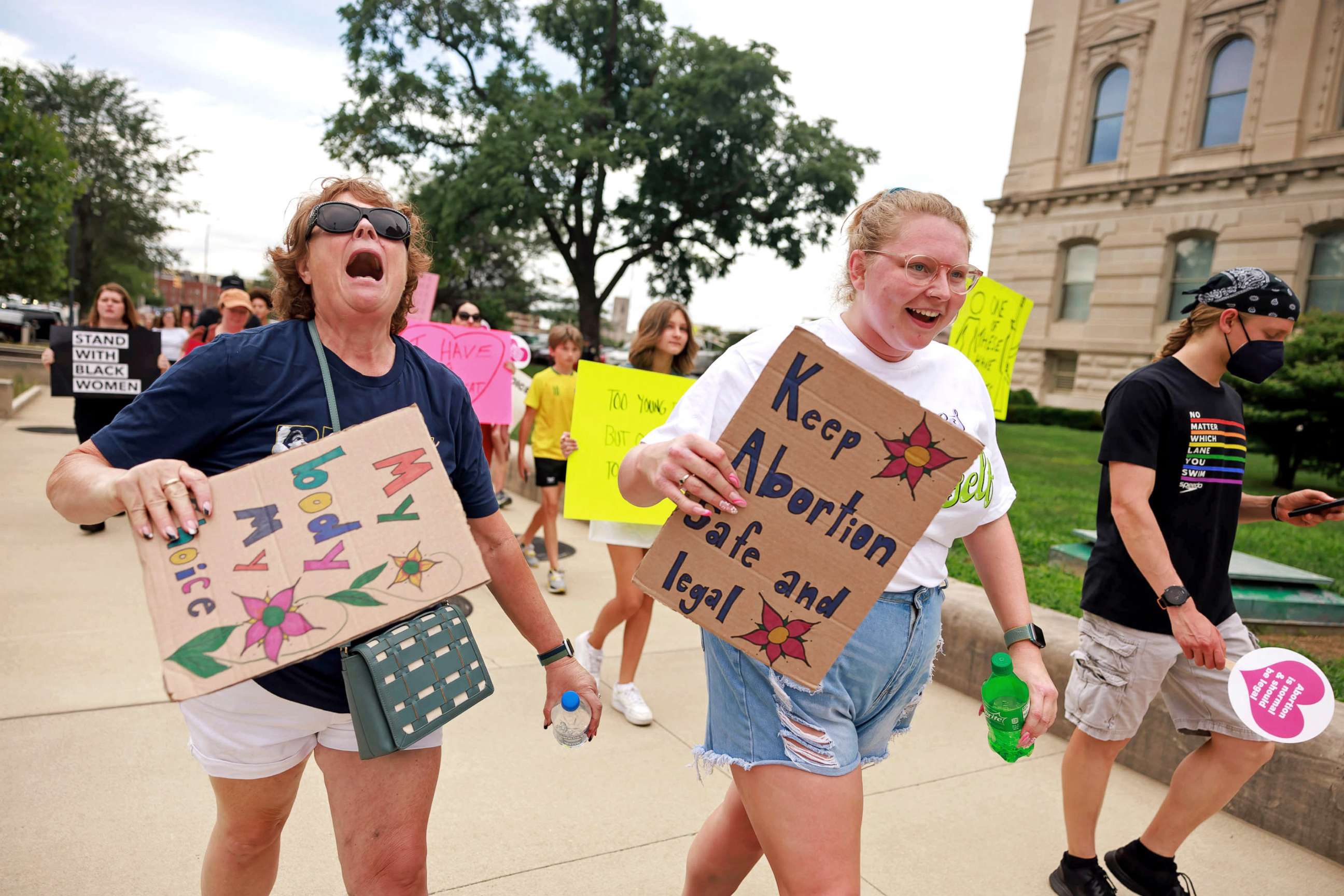PHOTO: Abortion-rights protesters march around the Indiana State house during a demonstration on July 25, 2022 in Indianapolis. 