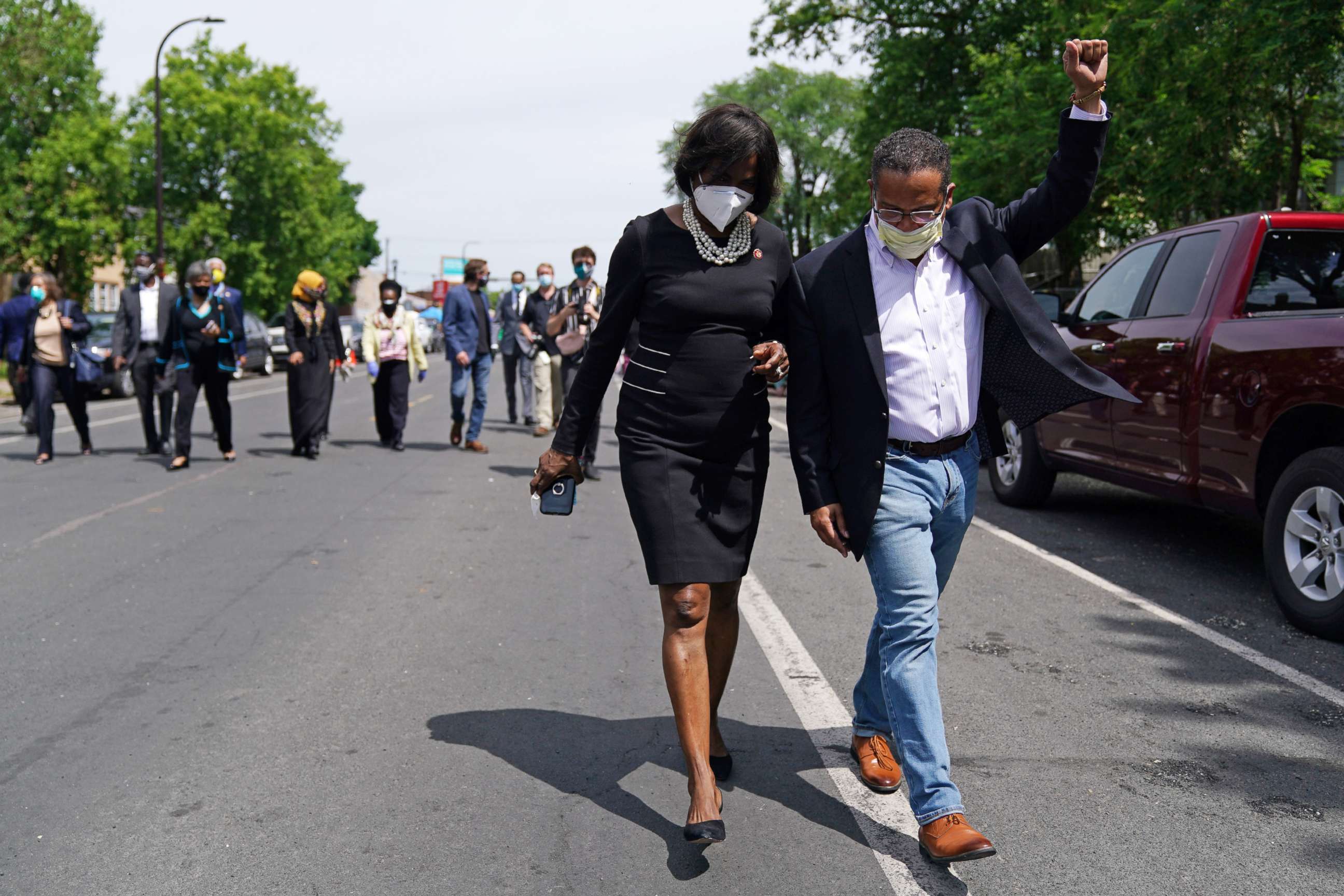 PHOTO: State Attorney General Keith Ellison pumped his fist to cheers from onlookers after he and members of the United States Congressional Black Caucus visited the site of George Floyd's death, June 4, 2020, in south Minneapolis.
