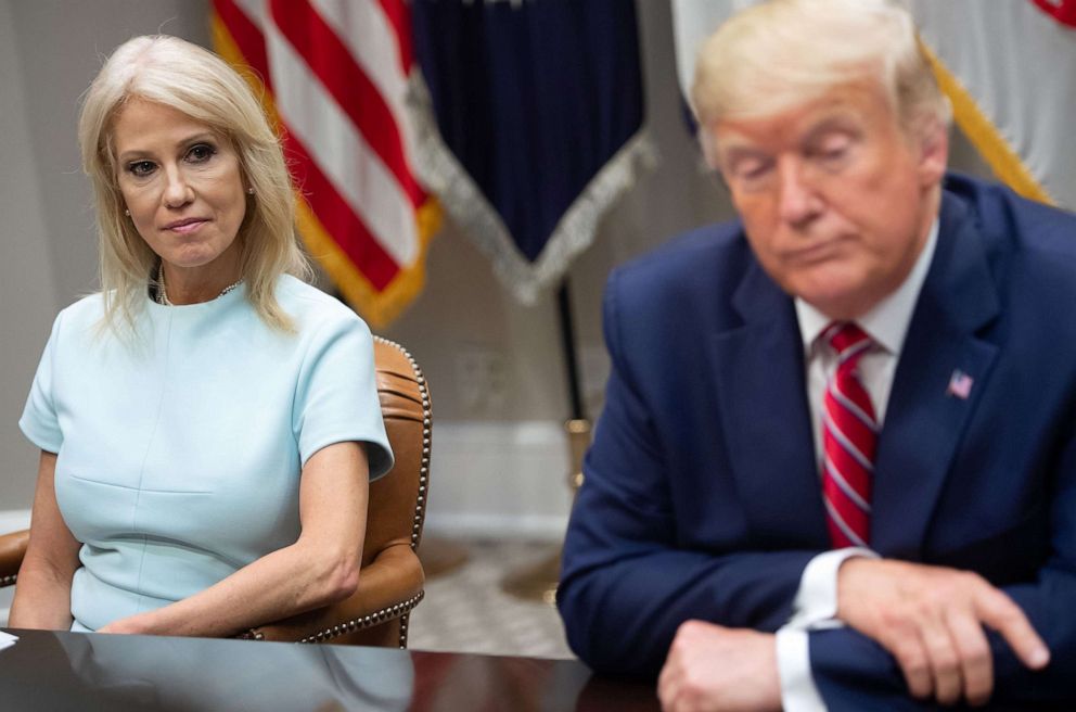 PHOTO: In this June 12, 2019, file photo, President Donald Trump sits alongside Kellyanne Conway, counselor to the President, during a meeting in the White House in Washington, D.C.