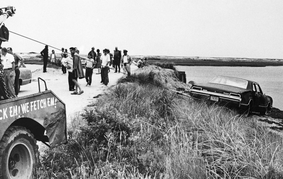 PHOTO: A tow truck pulls Senator Edward Kennedy's car out of Poucha Pond after the Senator's infamous accident on Chappaquiddick Island.