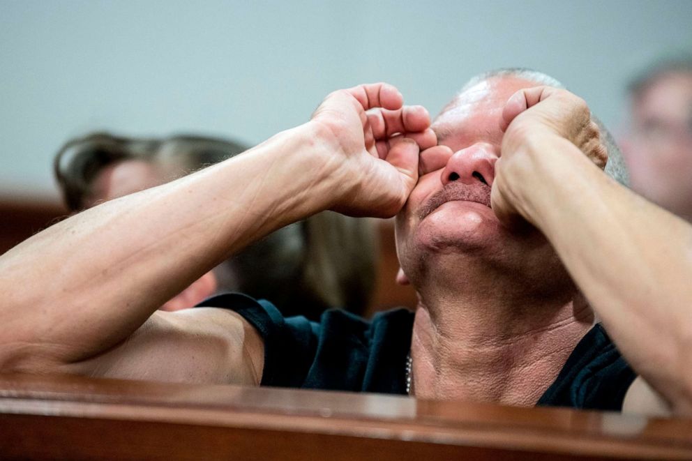 PHOTO: Kenneth White, father of 32-year-old Kenneth A. White, wipes away tears as he listens to closing arguments from multiple attorneys across four juvenile sentencing hearings on Wednesday, June 19, 2019, at Genesee Circuit Court in Flint., Mich.