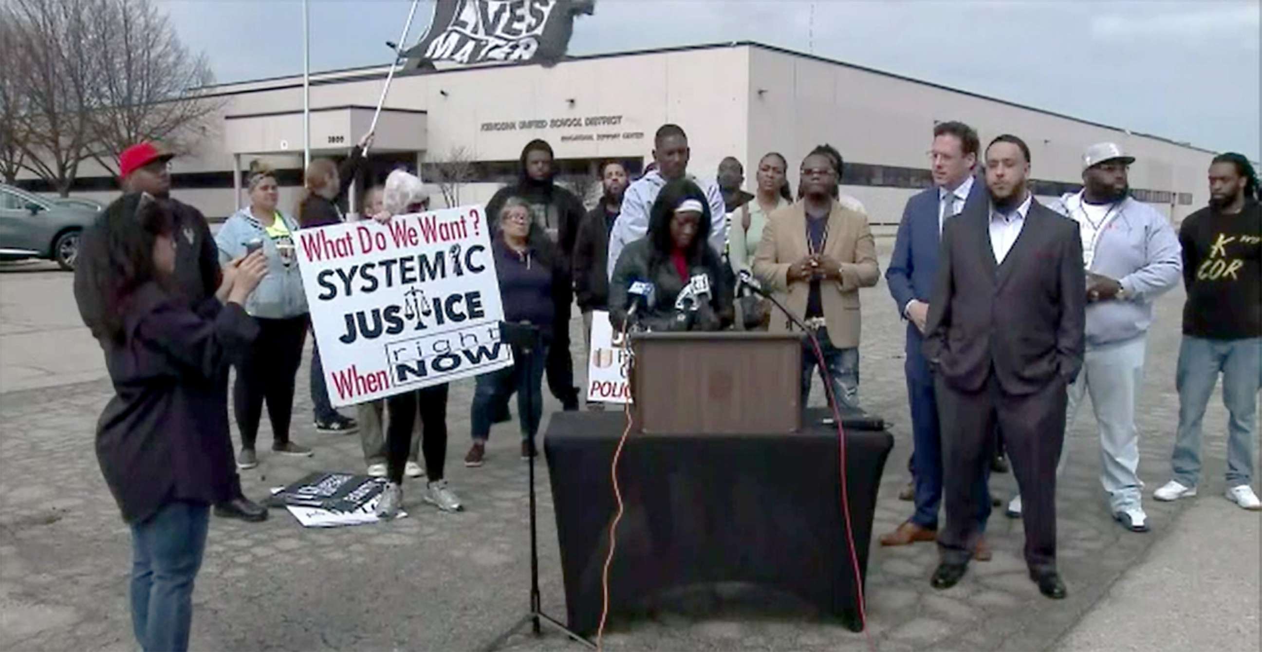 PHOTO: Jerrel Perez (r) is joined by supporters during a press conference in Kenosha, Wisc., March 16, 2022.