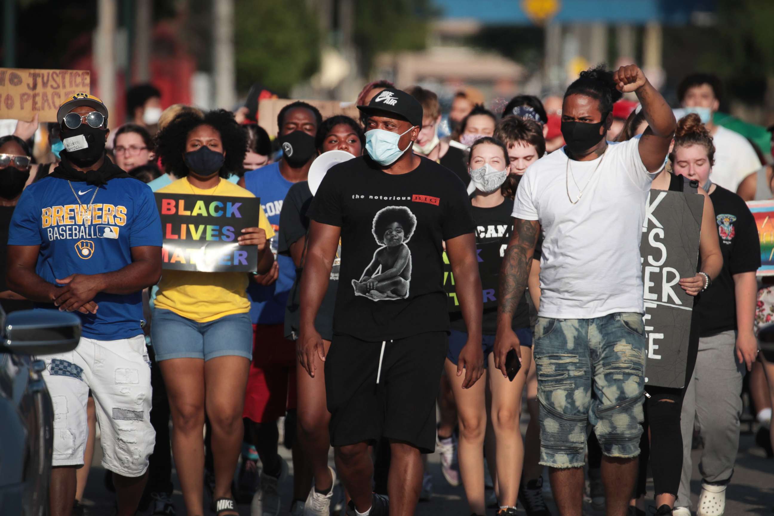 PHOTO: Demonstrators protesting the shooting of Jacob Blake march through a neighborhood on Aug. 27, 2020, in Kenosha, Wis.