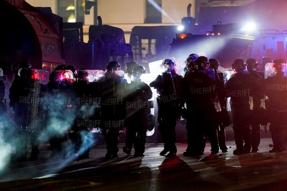 PHOTO: Authorities disperse protesters out of a park Tuesday, Aug. 25, 2020 in Kenosha, Wis.