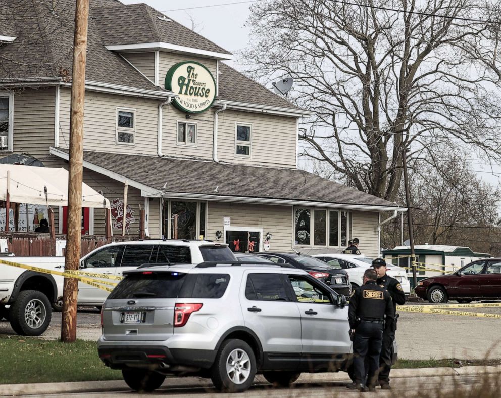 PHOTO: Law enforcement investigate the Somers House bar where a shooting occurred in the early morning, April 18, 2021, in Kenosha Wisconsin.