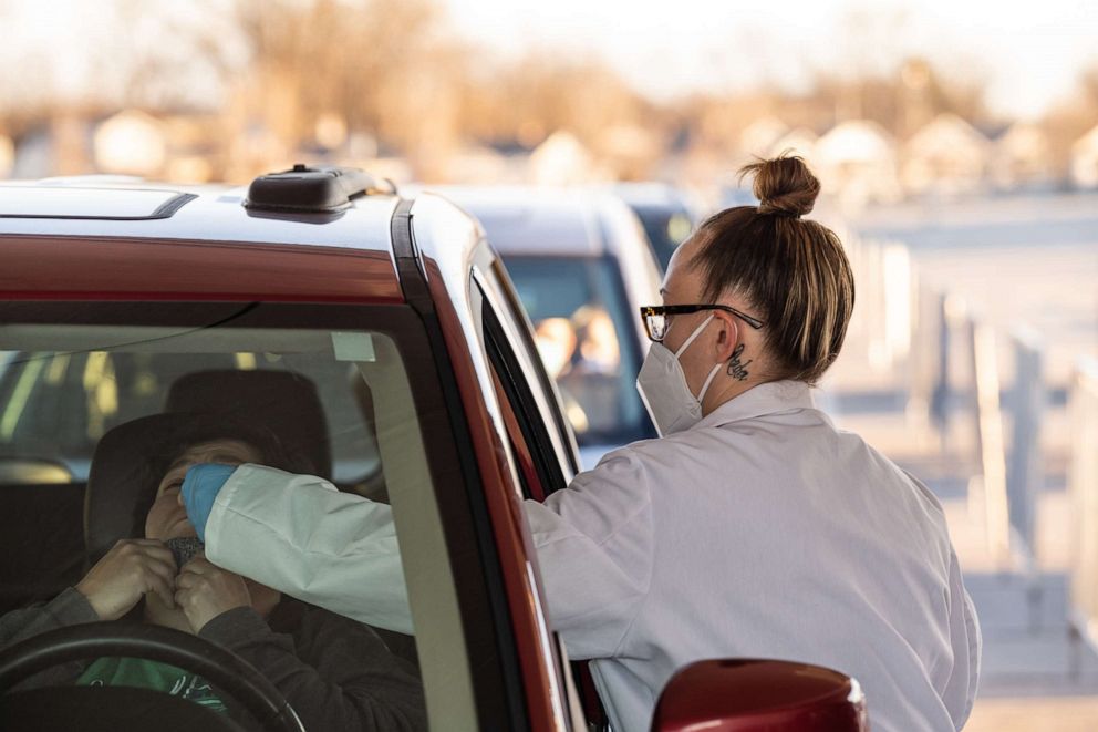 PHOTO: LOUISVILLE, KY - JANUARY 10: A Bluewater Diagnostic Laboratories technician administ