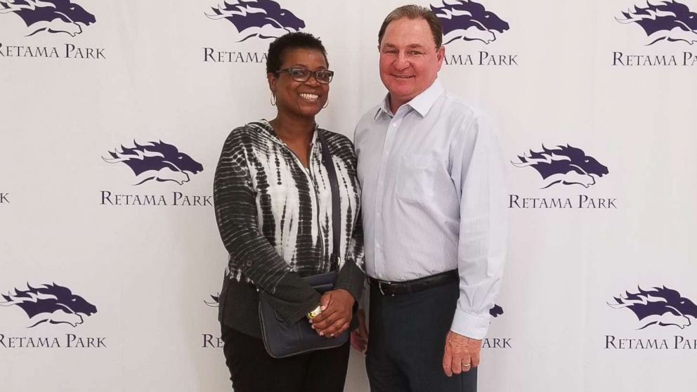 PHOTO: A woman who won $1.2 million on Kentucky Derby day poses in this photo with Bill Belcher, vice president and general manager of the Retama Park race track near San Antonio, where the winning bet was placed.