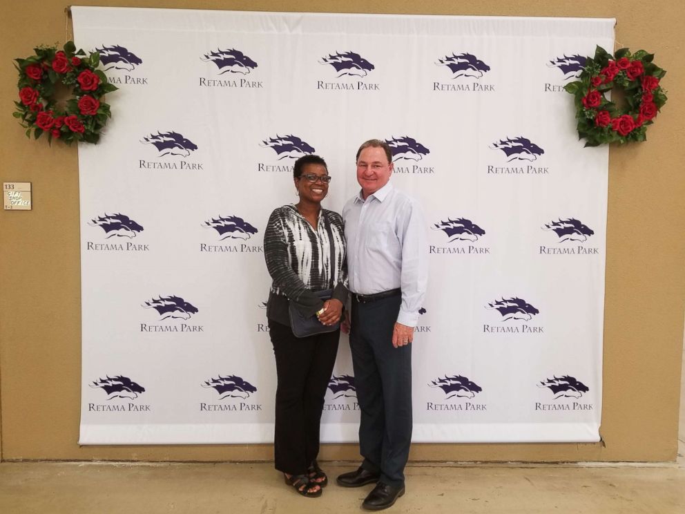 PHOTO: A woman who won $1.2 million on Kentucky Derby day poses in this photo with Bill Belcher, vice president and general manager of the Retama Park race track near San Antonio, where the winning bet was placed.