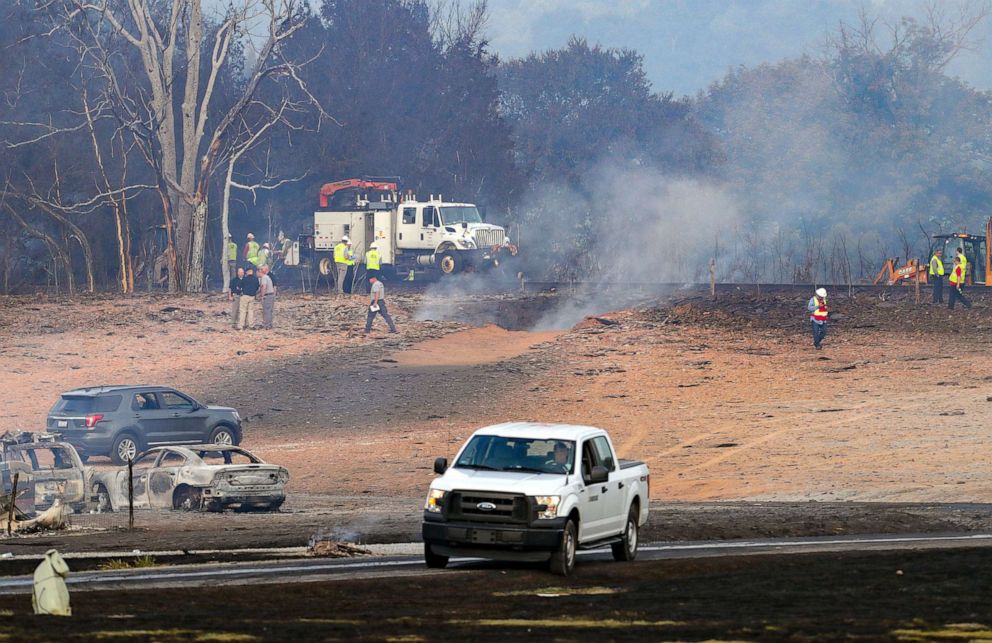 PHOTO: A large crater is visible near a railroad crossing after a pipeline explosion near a trailer park just south of Danville, Ky., Aug. 1, 2019.