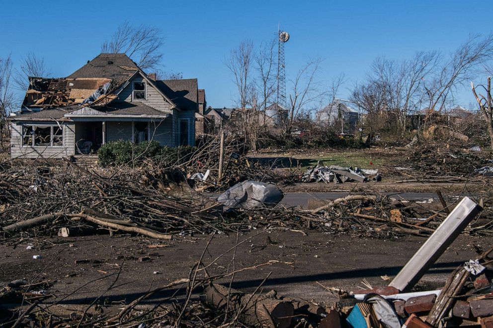 PHOTO: A home is badly damaged following a tornado three days prior, on Dec. 13, 2021 in Mayfield, Kentucky.