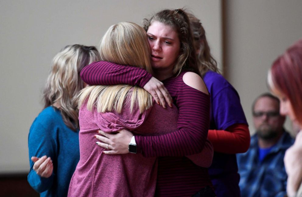 PHOTO: Students attend a prayer vigil for students killed and injured after a 15-year-old boy opened fire with a handgun at Marshall County High School, at Life in Christ Church in Marion, Kentucky, Jan. 23, 2018.  