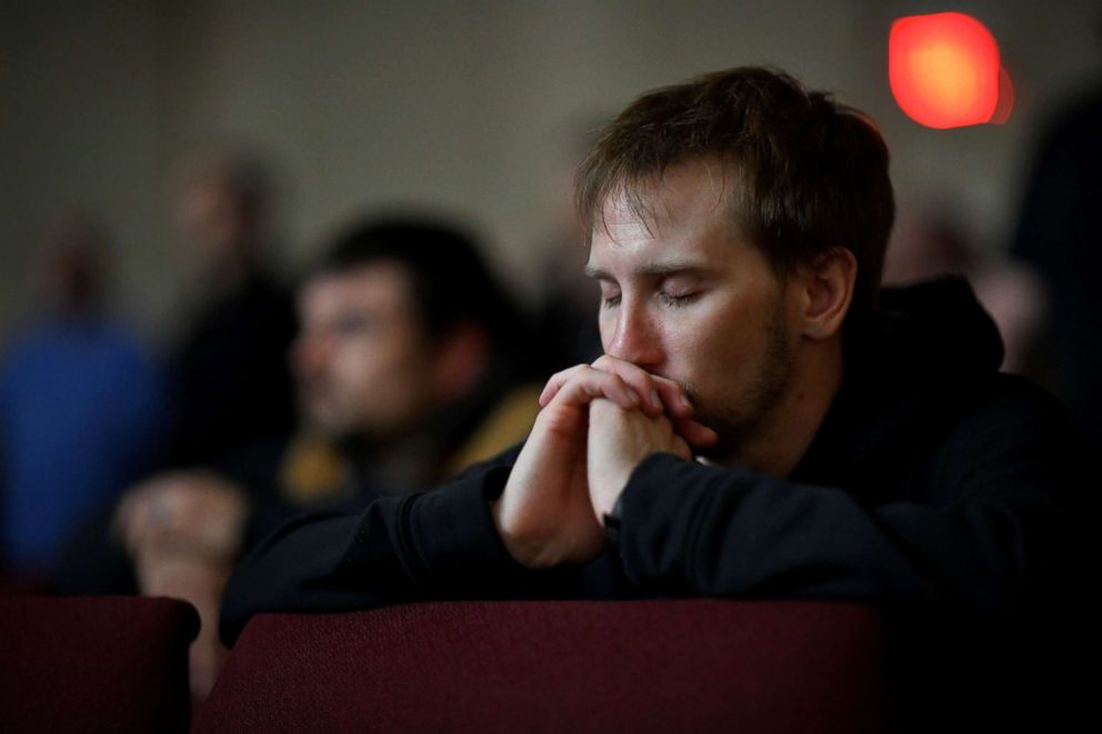 PHOTO: Stewart Walker attends a prayer vigil for students killed and injured after a 15-year-old boy opened fire with a handgun at Marshall County High School, at Life in Christ Church in Marion, Kentucky, Jan. 23, 2018.  