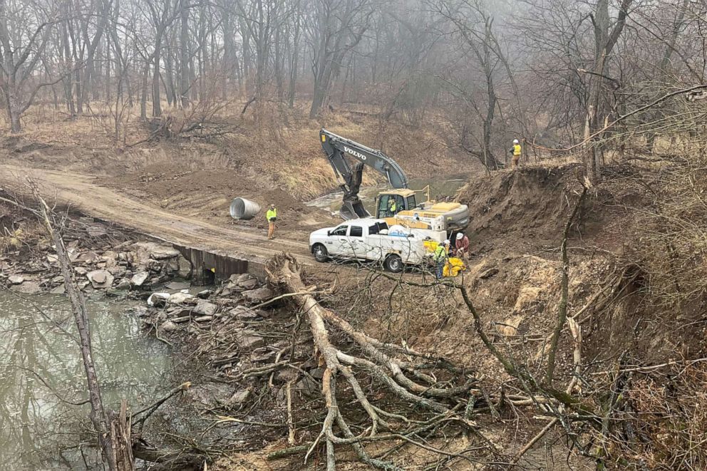PHOTO: Washington County Road Department constructs an emergency dam to intercept an oil spill after a Keystone pipeline ruptured at Mill Creek in Washington County, Kanas, Dec 8, 2022.