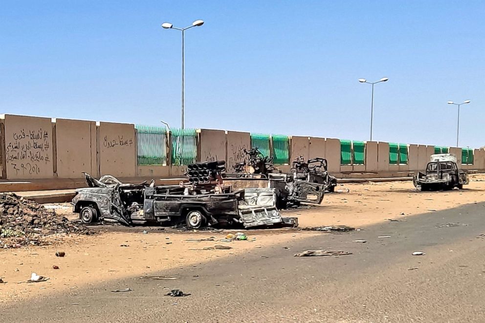PHOTO: This picture shows destroyed vehicles in southern Khartoum, Sudan, on April 19, 2023, amid fighting between Sudan's regular army and paramilitaries following the collapse of a 24-hour truce.